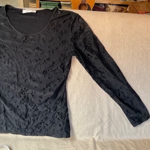 Black  pullover top with floral in black flowers design